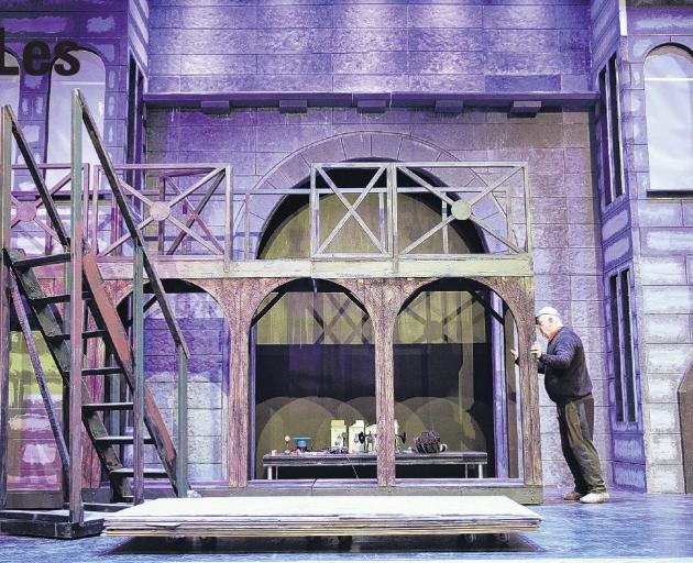 Set co-ordinator David Bleach is among volunteers getting the Les Miserables set ready. Photo:...