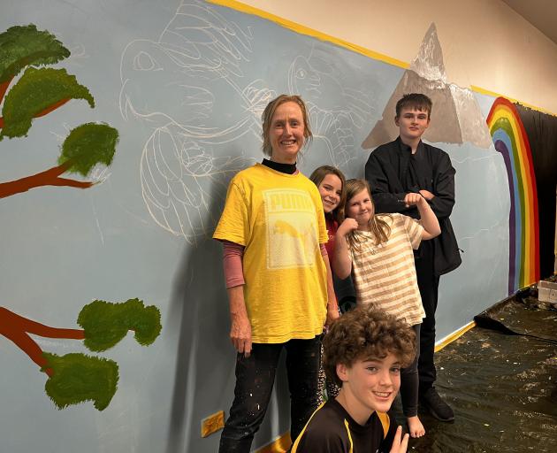 Kahu Youth’s mural evolved this week under the watchful eye of Wānaka artist Chrissy Wicks (left)...