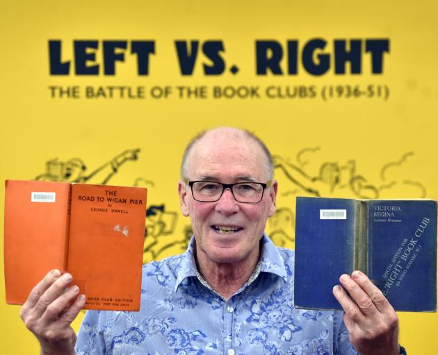 Dunedin Public Libraries heritage collections librarian Donald Kerr holds books from the Left...