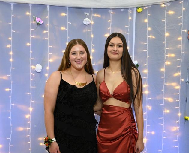 Deegan Croucher (left), 17, and Kassia Barrett-Garrity, 17, pose for a photo together.