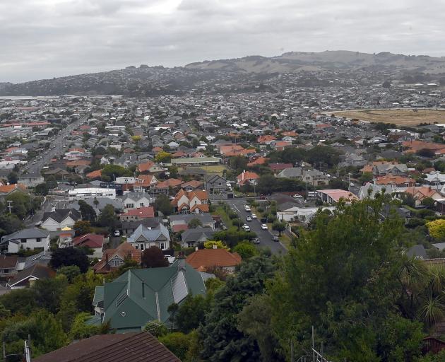 The flat, low-lying suburb of South Dunedin is surrounded by a harbour, the Pacific Ocean and...
