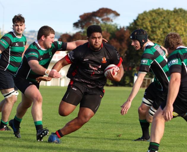 Sione Tukala powers  through Maheno’s defence line. PHOTO: YAMMIE MCKENZIE PHOTOGRAPHY