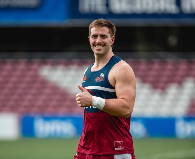 Joe Brial warming up last week for his Queensland Reds run-on debut. PHOTO: STEFAN AHFUNI