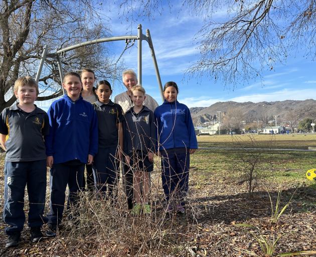 Checking the growth in the Alexandra Primary School forest walk are, from left, Toby Longman, 9,...