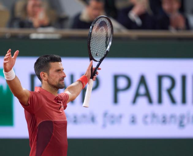 Novak Djokovic celebrates his early morning victory against Lorenzo Musetti. Photo: Getty Images