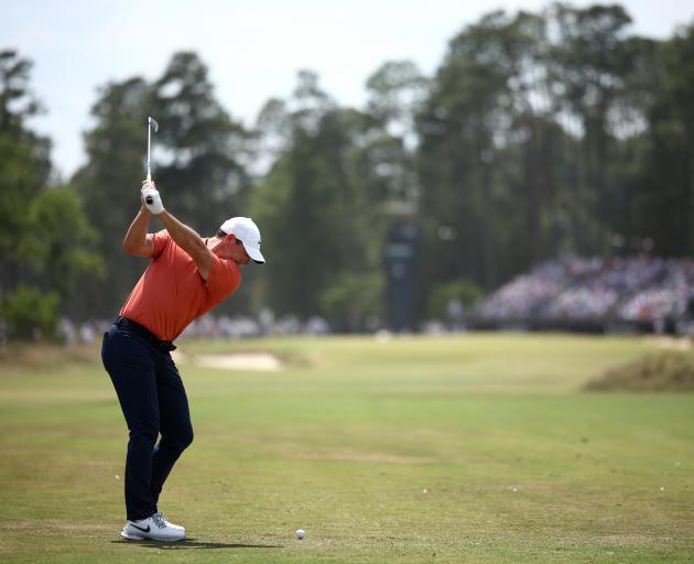 Rory McIlroy holds a share of the lead after the first round at the notoriously challenging...