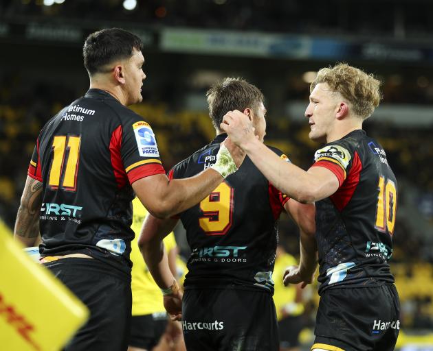 Daniel Rona of the Chiefs celebrates with Damian McKenzie after scoring a try. Photo: Getty Images