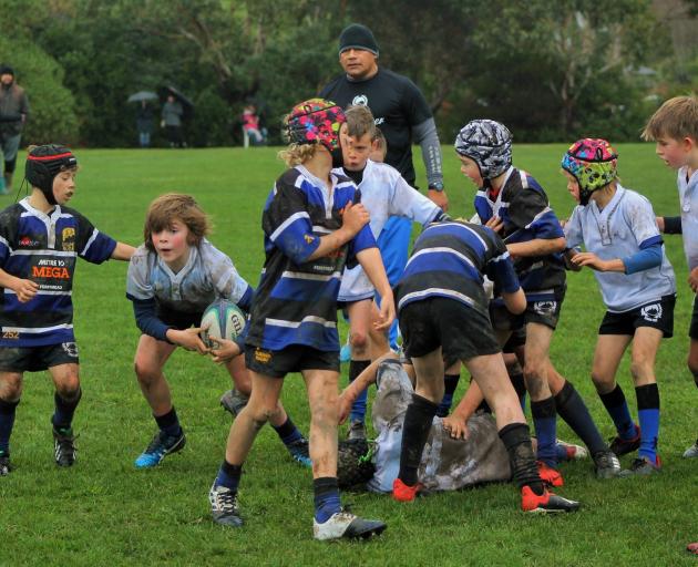 Robbie Timo refereeing a junior game for Sumner. Photo: Supplied