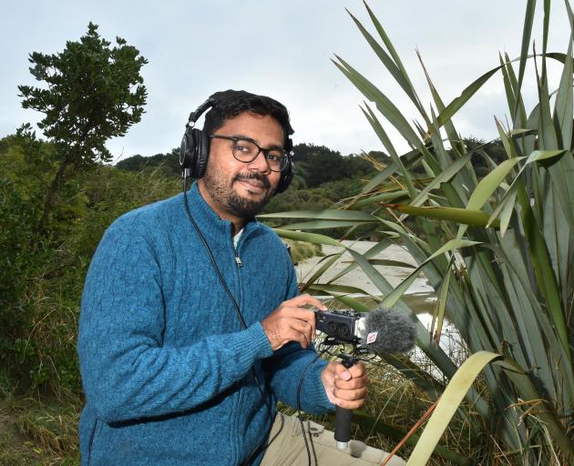 Dunedin wildlife podcaster and film-maker Karthic SS at Tomahawk Beach on Friday. PHOTO: GREGOR...