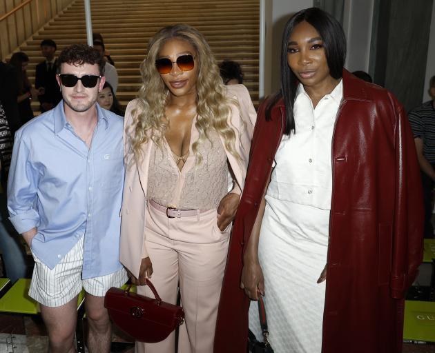 Paul Mescal with Serena and Venus Williams at the Gucci show. Photo: Getty Images