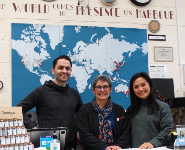 The new co-owners of Presence on Harbour Brendan Rivalin (left) and Yuli Lin (right) take advice...