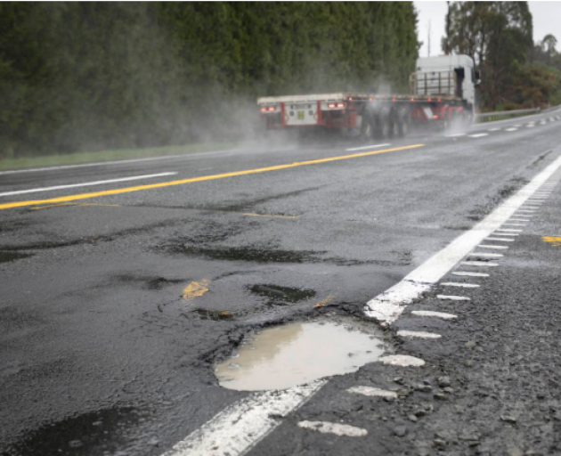 A large pothole on the side of SH33 near Paengaroa. Photo: Andrew Warner