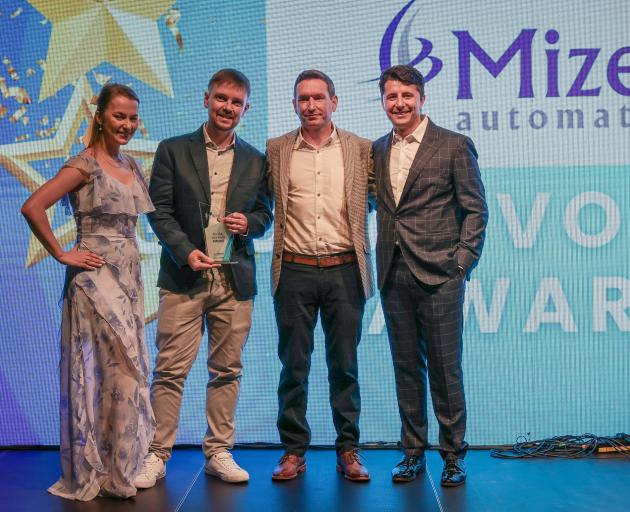 Picking up their Global Voyager award in Prague earlier this month are Mizen Automation senior...