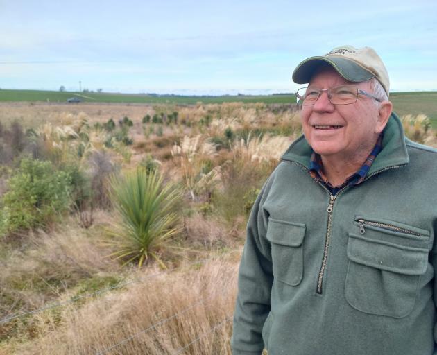 Waimate farmer Martyn Jensen inspects a planting to improve water quality on his family’s...