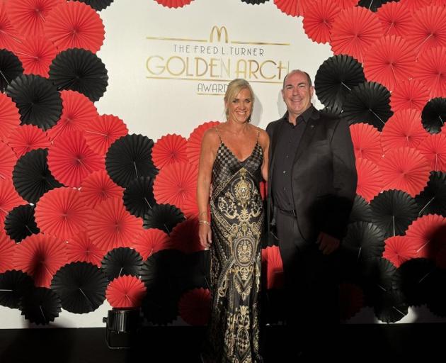 Chris and Liz Boon, accepting the Fred L Turner Golden Arch Award at the 2024 McDonald’s...