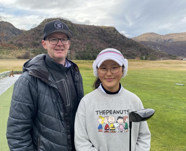 Yoonae Jeong at Millbrook’s driving range last Sunday with her coach Ben Gallie. PHOTO: PHILIP...