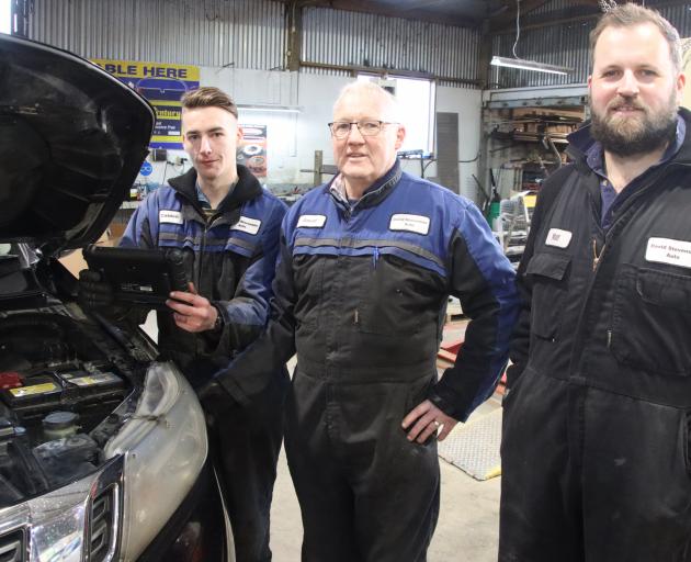 David Stevenson Auto apprentice Caiden Reid (left) practises using the workshop’s new Autel...