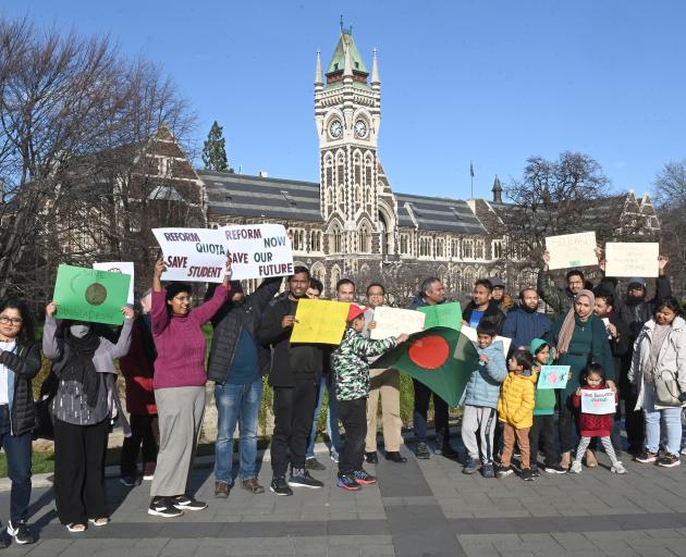 Bangladeshi students protest outside the St David Complex at the University of Otago yesterday....