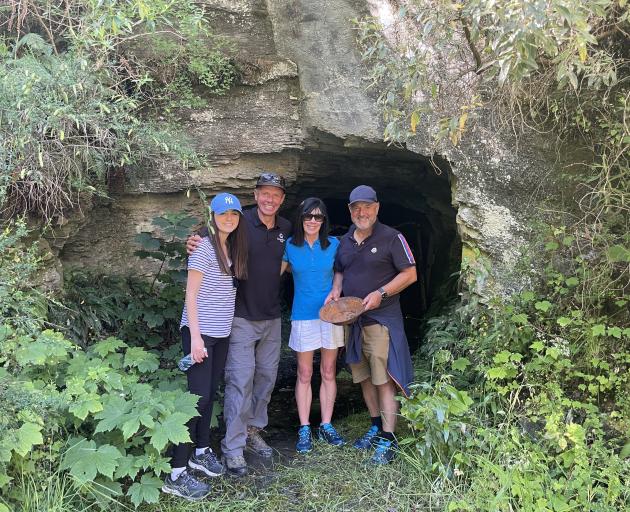 Pictured at the entrance to the "Hugo Tunnel", part of a new section of the Queenstown Trail are,...
