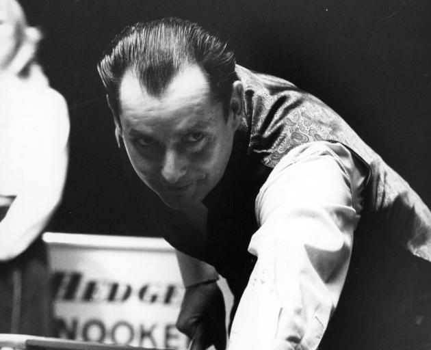 Ray Reardon keeps an eye on his balls as he takes a shot during the Benson and Hedges Snooker...