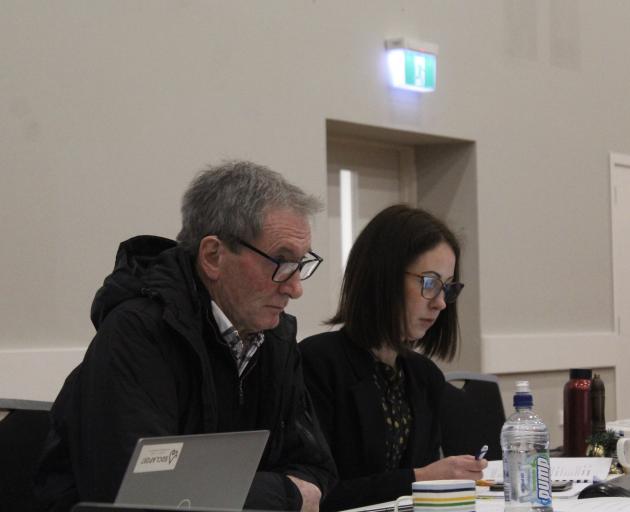 Oreti Community Board chairman Colin Smith listens as a meeting at the Winton Memorial Hall...