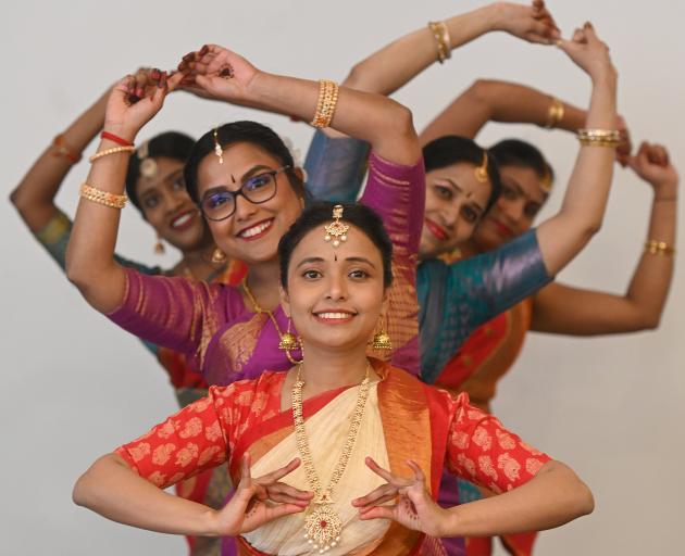 Celebrating India’s independence day are dancers Thiloma Liyanage (centre front) and (from left)...