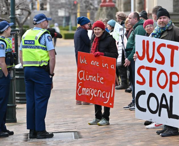 Supporters of those charged in a coal protest continued to push the cause outside the Dunedin...