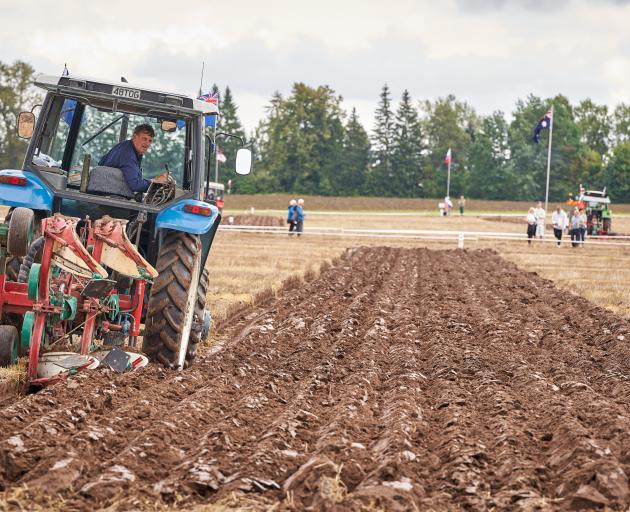 Bob Mehrtens, of Timaru, competes in the reversible class at the World Ploughing Contest. PHOTOS:...