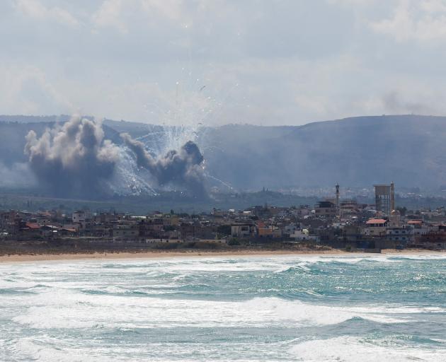 Smoke rises over southern Lebanon from Israeli air strikes. Photo: Reuters 
