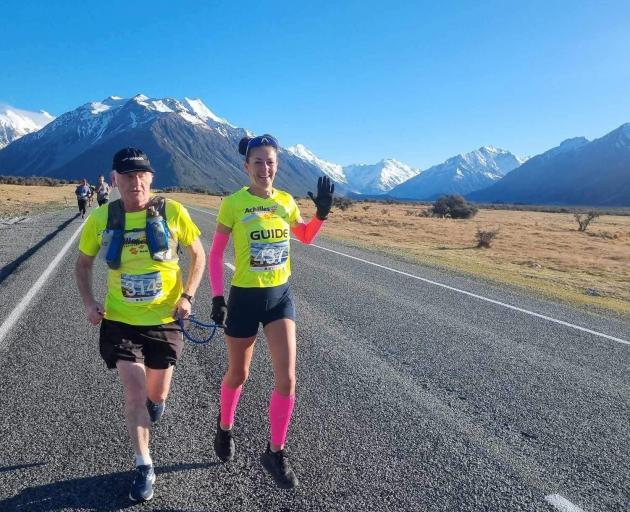 Blind runner Paul Barclay and his guide Rosie Hay take part in a previous marathon. PHOTO: SUPPLIED