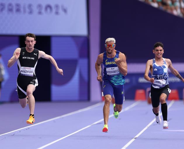 William Stedman (left) finished his Games on a high, posting a national record time of 12.35, and...