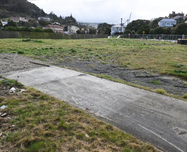 Work has ground to a halt on this Albertson Ave, Port Chalmers site where new Kāinga Ora homes...