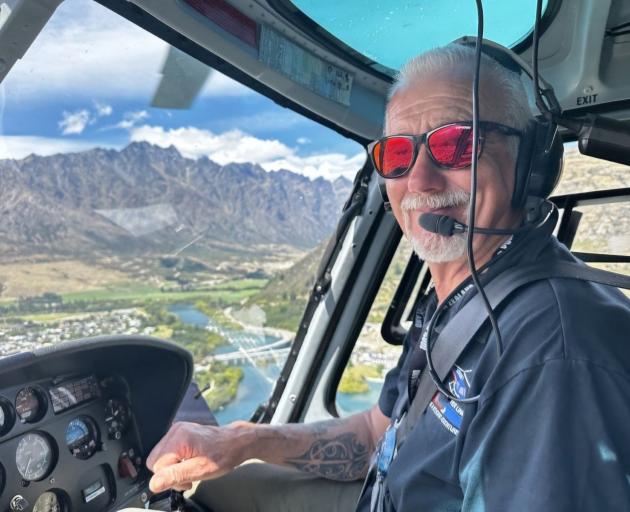 Pete ‘Saxmo’ Sexton in his happy place flying above Queenstown’s Frankton Arm. PHOTO: SUPPLIED