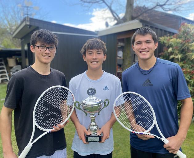 From left, Dan, Noa and Kai Milburn pictured recently on a rare occasion when they were all at...