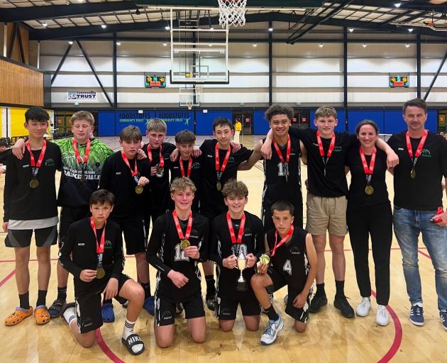 The South Canterbury Black U14 team celebrate winning the Basketball New Zealand Southern...