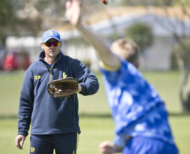 Otago coach Ashley Noffke puts Luke Georgeson through his paces during a training session in...