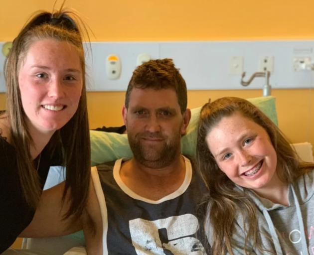 Blair Vining and his daughters Lily and Della-May. Photo: Facebook/Blair Vining