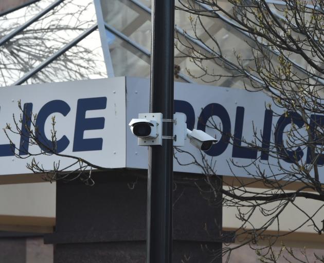 Security cameras keep watch over the comings and goings at the Bus Hub, outside the police...