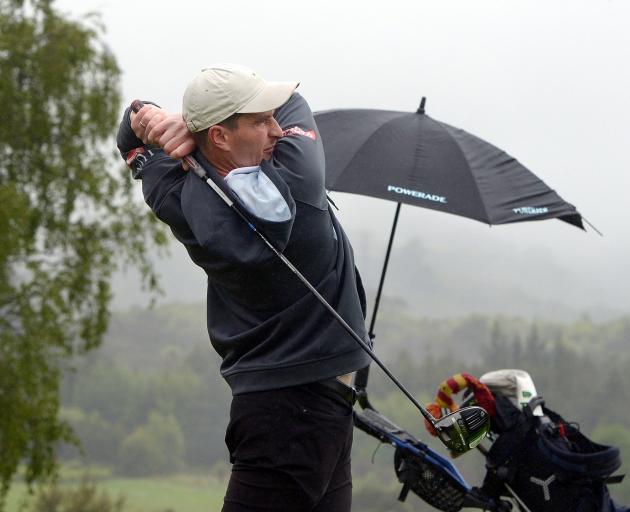 Duncan Croudis tees off the first hole during the Otago matchplay at Balmacewen yesterday. PHOTO:...