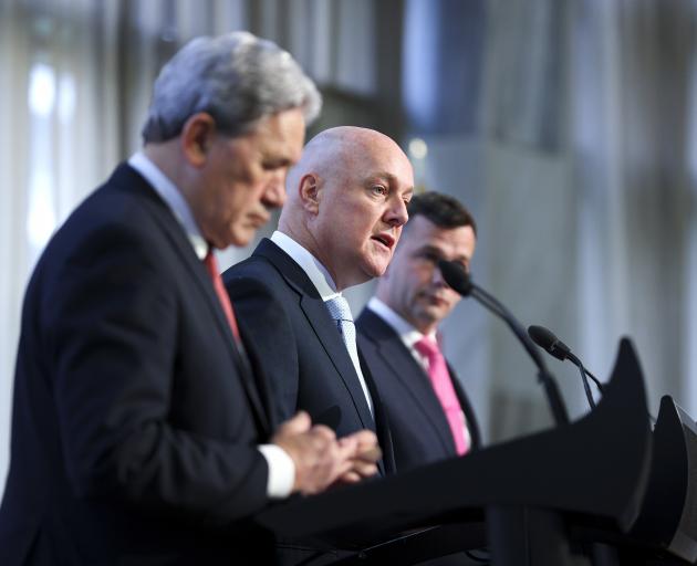 The three leaders of the coalition government, Winston Peters, Christopher Luxon, and David...