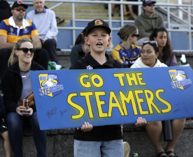 A young Bay of Plenty fan cheers for the Steamers during an NPC game in Tauranga. PHOTO: GETTY...