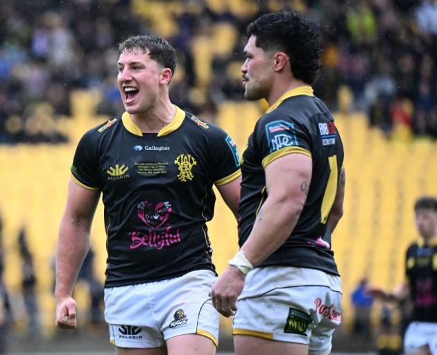 Riley Higgins and Du Plessis Kirifi of Wellington celebrate during NPC final between Wellington...