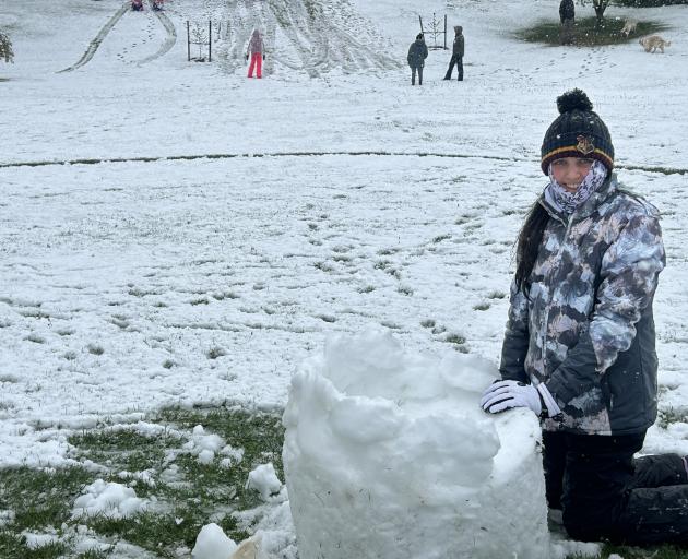 Preparing to build a snow chair in Centennial Park, Alexandra, is Ellena Graves, 13, of Alexandra...