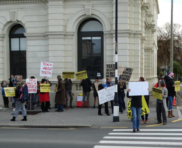 A group of anti-fluoride protesters picket outside the Waitaki District Council building in July....