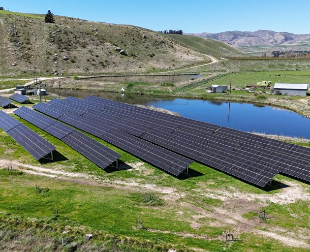 The solar system Sam Spiers has installed at his Tarras farm totals 1000 solar panels spread...