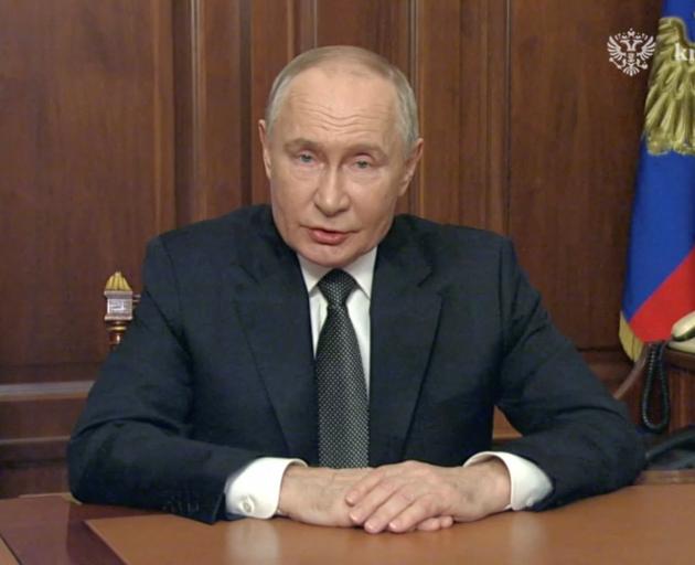 Russian President Vladimir Putin makes a televised address in Moscow. Photo: Kremlin.ru/Handout...