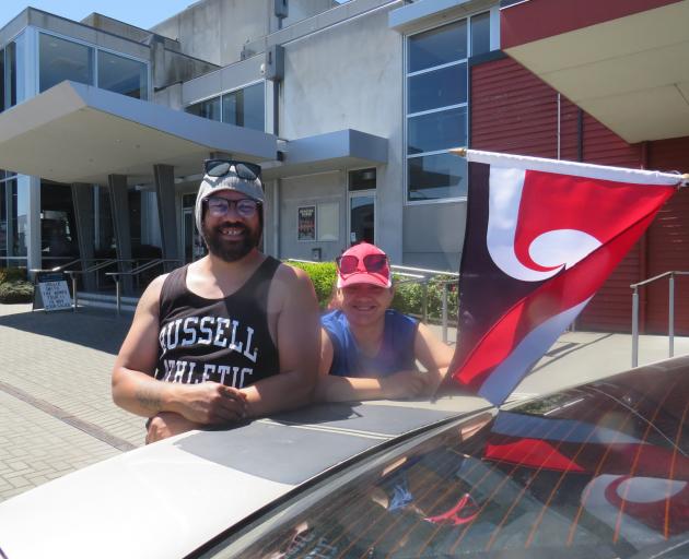 Tk Paul and his wife Karla waiting for Prime Minister Christopher Luxon. Photo: Supplied