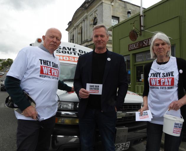 Waitaki District Mayor Gary Kircher (centre) stops off to say hello to Mike Waddell and partner...
