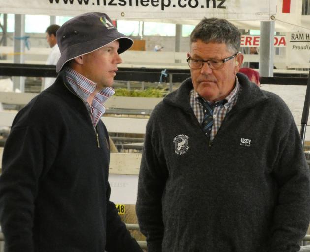 Sheep convener Charles Miller-Brown (left) checks in with Waimate stud breeder Chris Medlicott to...