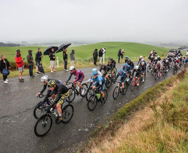 Riders make their way up the Waimumu hill climb on stage six of the Tour of Southland yesterday....